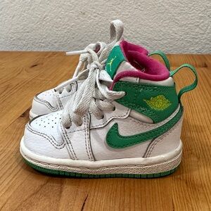 Baby Nike Air Jordans: White Sneakers with Green Swoosh and Pink Highlights